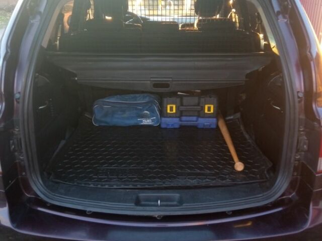 Cанг Йонг Кирон 2010 в Овруче на Automoto.ua Красный Cанг Йонг Кирон, объемом двигателя 2 л и пробегом 158 тыс. км за 7500 $, фото 2 на Automoto.ua