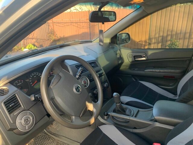 Сірий Cанг Йонг Kyron, об'ємом двигуна 2 л та пробігом 191 тис. км за 4300 $, фото 18 на Automoto.ua