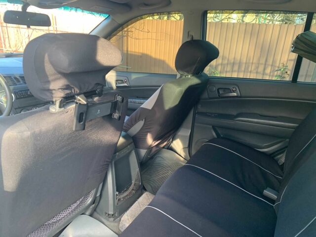 Сірий Cанг Йонг Kyron, об'ємом двигуна 2 л та пробігом 191 тис. км за 4300 $, фото 17 на Automoto.ua