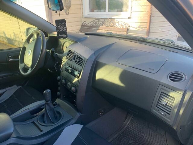 Сірий Cанг Йонг Kyron, об'ємом двигуна 2 л та пробігом 191 тис. км за 4300 $, фото 19 на Automoto.ua