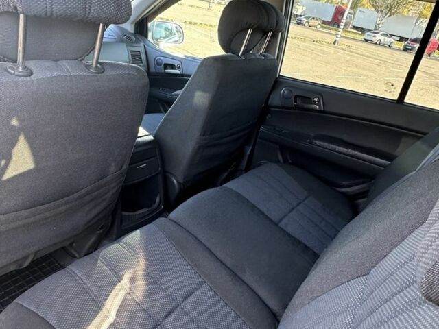 Сірий Cанг Йонг Kyron, об'ємом двигуна 2 л та пробігом 235 тис. км за 6500 $, фото 6 на Automoto.ua