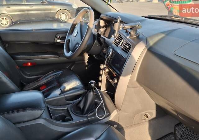 Серый Cанг Йонг Кирон, объемом двигателя 2 л и пробегом 355 тыс. км за 6800 $, фото 3 на Automoto.ua