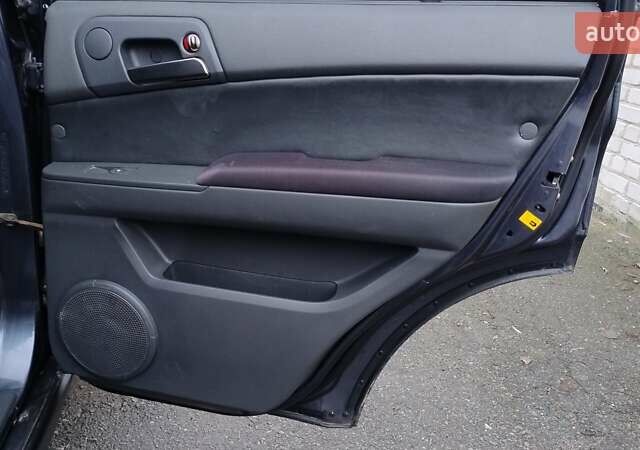 Сірий Cанг Йонг Kyron, об'ємом двигуна 2 л та пробігом 289 тис. км за 4999 $, фото 23 на Automoto.ua