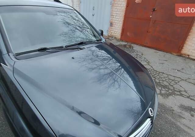 Сірий Cанг Йонг Kyron, об'ємом двигуна 2 л та пробігом 289 тис. км за 4999 $, фото 11 на Automoto.ua