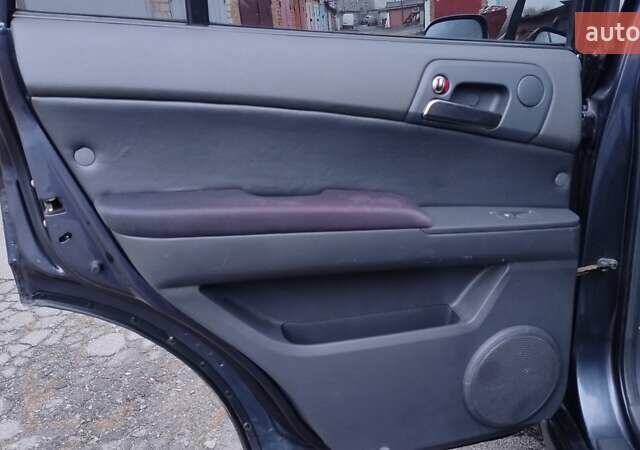 Сірий Cанг Йонг Kyron, об'ємом двигуна 2 л та пробігом 289 тис. км за 4999 $, фото 21 на Automoto.ua