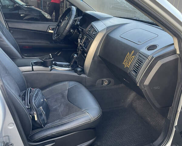 Сірий Cанг Йонг Kyron, об'ємом двигуна 2 л та пробігом 261 тис. км за 9000 $, фото 11 на Automoto.ua