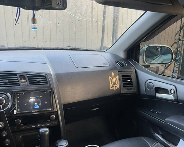 Сірий Cанг Йонг Kyron, об'ємом двигуна 2 л та пробігом 261 тис. км за 9000 $, фото 15 на Automoto.ua