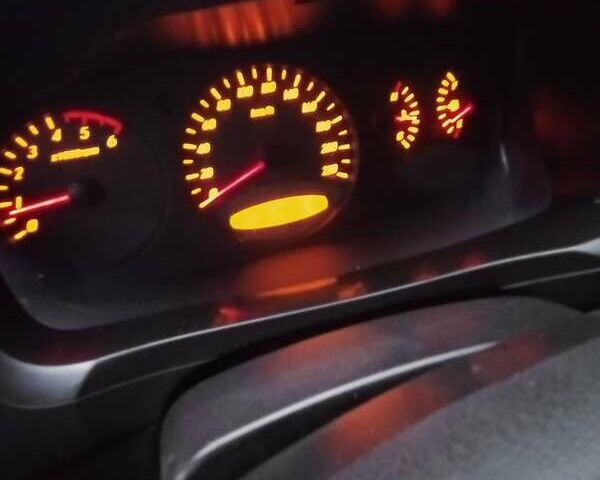 Сірий Cанг Йонг Kyron, об'ємом двигуна 2 л та пробігом 260 тис. км за 6400 $, фото 13 на Automoto.ua