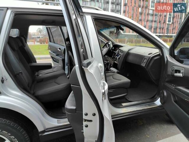 Серый Cанг Йонг Кирон, объемом двигателя 2.3 л и пробегом 163 тыс. км за 5990 $, фото 24 на Automoto.ua