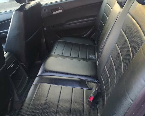 Серый Cанг Йонг Кирон, объемом двигателя 2 л и пробегом 218 тыс. км за 7200 $, фото 6 на Automoto.ua
