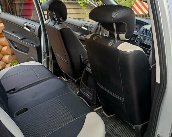 Серый Cанг Йонг Кирон, объемом двигателя 2 л и пробегом 129 тыс. км за 8399 $, фото 20 на Automoto.ua