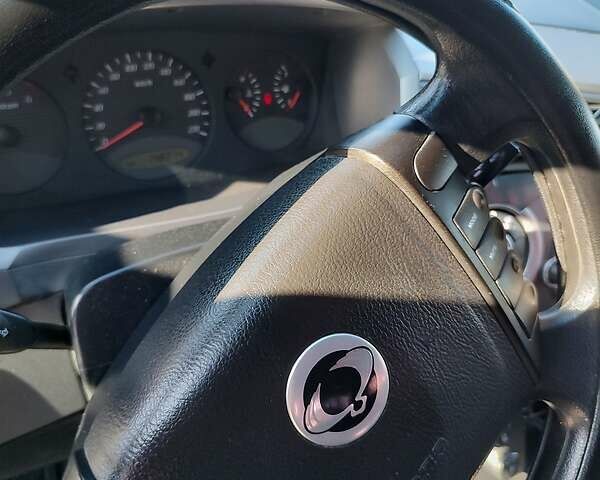 Серый Cанг Йонг Кирон, объемом двигателя 2 л и пробегом 165 тыс. км за 9000 $, фото 5 на Automoto.ua