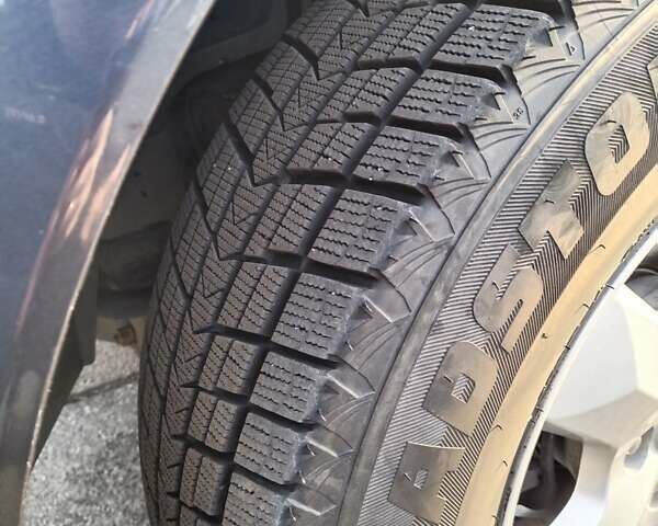 Серый Cанг Йонг Кирон, объемом двигателя 2.3 л и пробегом 126 тыс. км за 9700 $, фото 4 на Automoto.ua