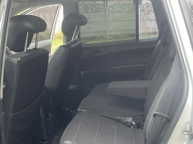 Серый Cанг Йонг Кирон, объемом двигателя 2 л и пробегом 125 тыс. км за 8500 $, фото 8 на Automoto.ua