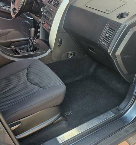 Серый Cанг Йонг Кирон, объемом двигателя 2 л и пробегом 150 тыс. км за 10000 $, фото 11 на Automoto.ua