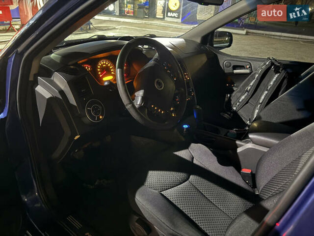 Синий Cанг Йонг Кирон, объемом двигателя 2 л и пробегом 250 тыс. км за 8000 $, фото 12 на Automoto.ua
