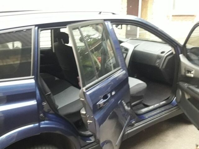 Синій Cанг Йонг Kyron, об'ємом двигуна 2.3 л та пробігом 232 тис. км за 7100 $, фото 7 на Automoto.ua