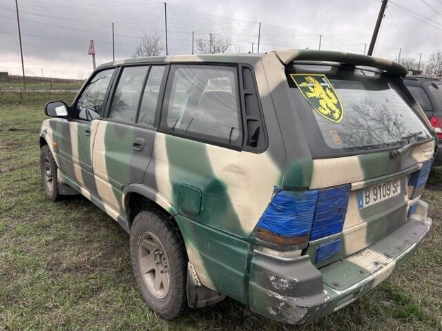 Белый Cанг Йонг Муссо, объемом двигателя 2.9 л и пробегом 200 тыс. км за 1426 $, фото 4 на Automoto.ua