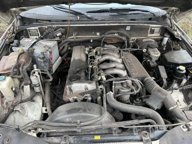 Белый Cанг Йонг Муссо, объемом двигателя 2.9 л и пробегом 200 тыс. км за 1426 $, фото 5 на Automoto.ua