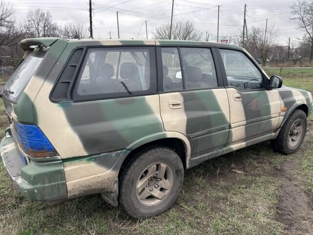 Белый Cанг Йонг Муссо, объемом двигателя 2.9 л и пробегом 200 тыс. км за 1426 $, фото 2 на Automoto.ua