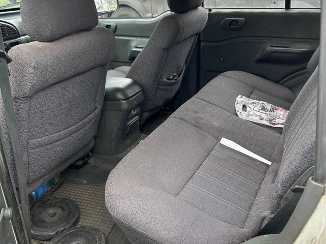 Белый Cанг Йонг Муссо, объемом двигателя 2.9 л и пробегом 200 тыс. км за 1426 $, фото 6 на Automoto.ua