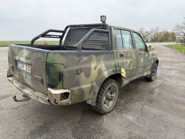 Бежевый Cанг Йонг Муссо, объемом двигателя 2.9 л и пробегом 200 тыс. км за 2200 $, фото 1 на Automoto.ua