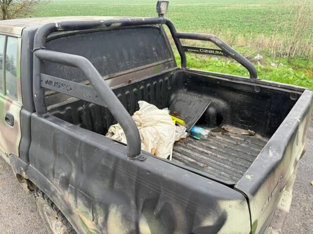 Бежевый Cанг Йонг Муссо, объемом двигателя 2.9 л и пробегом 200 тыс. км за 2200 $, фото 4 на Automoto.ua