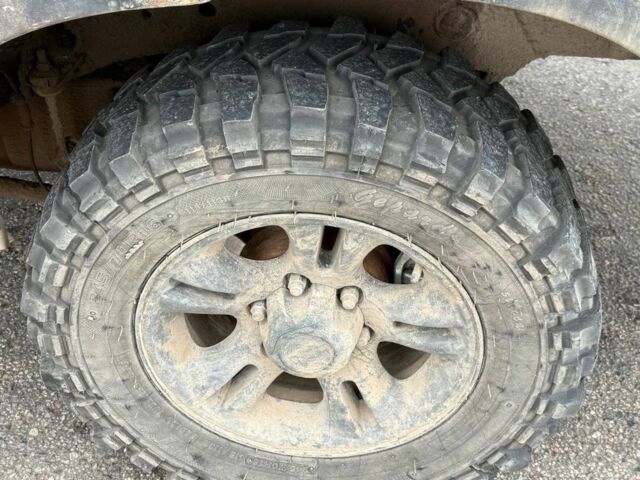 Бежевый Cанг Йонг Муссо, объемом двигателя 2.9 л и пробегом 200 тыс. км за 2200 $, фото 5 на Automoto.ua