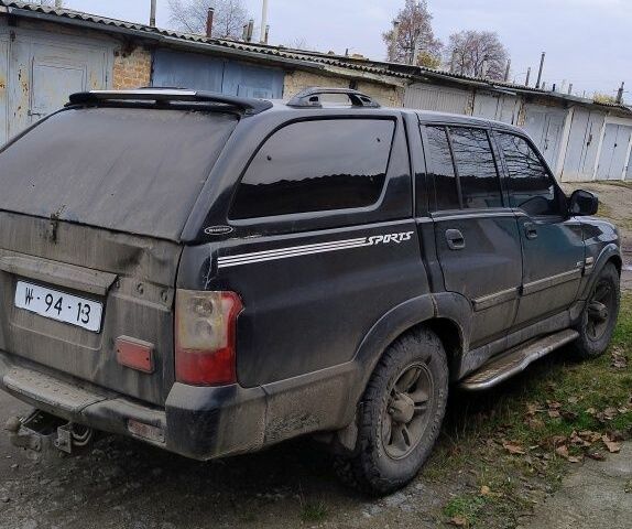 Чорний Cанг Йонг Муссо, об'ємом двигуна 2.9 л та пробігом 290 тис. км за 4734 $, фото 3 на Automoto.ua