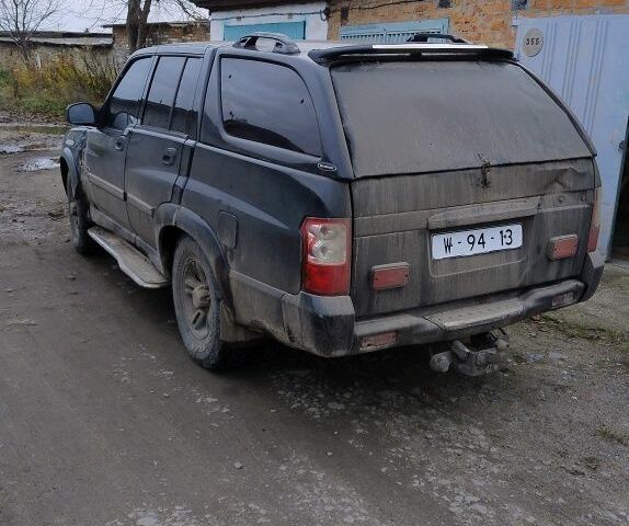 Черный Cанг Йонг Муссо, объемом двигателя 2.9 л и пробегом 255 тыс. км за 5429 $, фото 3 на Automoto.ua