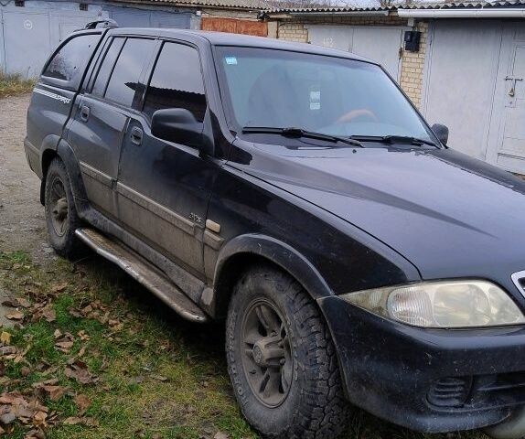 Чорний Cанг Йонг Муссо, об'ємом двигуна 2.9 л та пробігом 290 тис. км за 4734 $, фото 2 на Automoto.ua