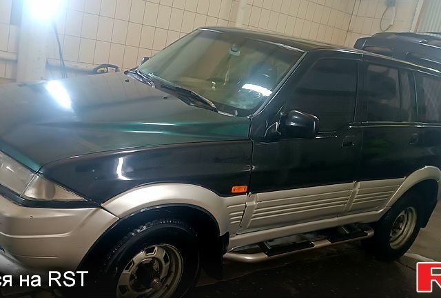 Чорний Cанг Йонг Муссо, об'ємом двигуна 2.9 л та пробігом 320 тис. км за 3300 $, фото 9 на Automoto.ua