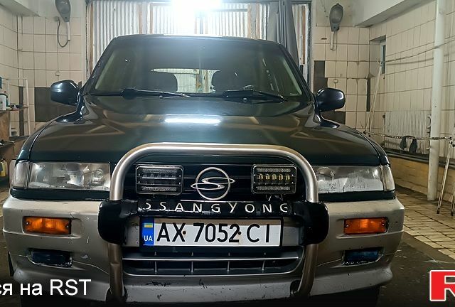 Чорний Cанг Йонг Муссо, об'ємом двигуна 2.9 л та пробігом 320 тис. км за 3300 $, фото 8 на Automoto.ua