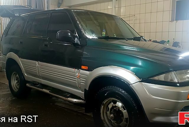 Чорний Cанг Йонг Муссо, об'ємом двигуна 2.9 л та пробігом 320 тис. км за 3300 $, фото 7 на Automoto.ua