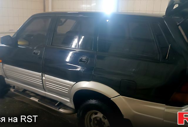 Чорний Cанг Йонг Муссо, об'ємом двигуна 2.9 л та пробігом 320 тис. км за 3300 $, фото 10 на Automoto.ua