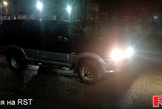 Чорний Cанг Йонг Муссо, об'ємом двигуна 2.9 л та пробігом 320 тис. км за 3300 $, фото 1 на Automoto.ua