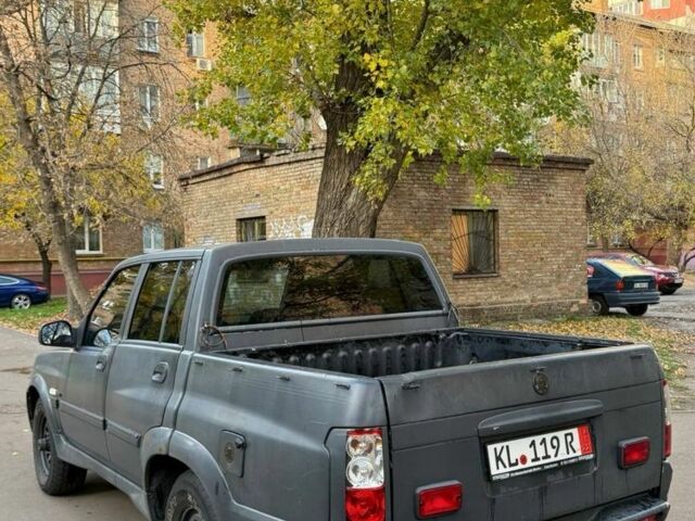 Серый Cанг Йонг Муссо, объемом двигателя 3 л и пробегом 300 тыс. км за 2350 $, фото 2 на Automoto.ua