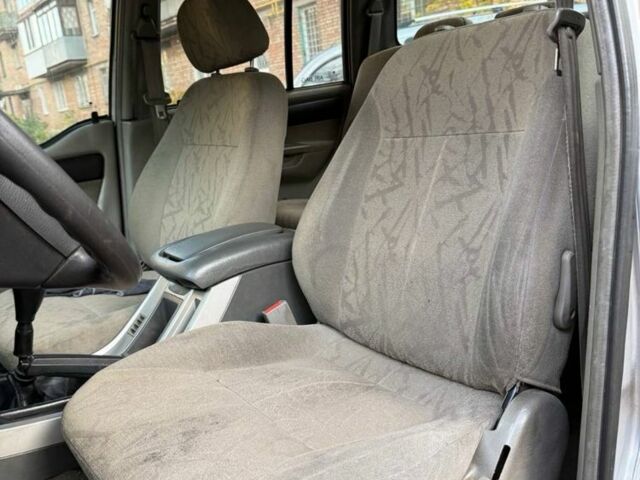 Серый Cанг Йонг Муссо, объемом двигателя 3 л и пробегом 300 тыс. км за 2350 $, фото 6 на Automoto.ua