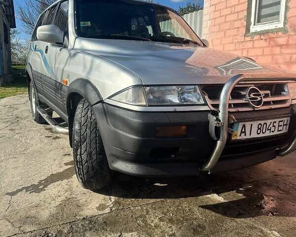 Серый Cанг Йонг Муссо, объемом двигателя 2.87 л и пробегом 450 тыс. км за 3900 $, фото 1 на Automoto.ua