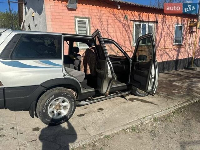 Серый Cанг Йонг Муссо, объемом двигателя 2.87 л и пробегом 450 тыс. км за 3900 $, фото 10 на Automoto.ua