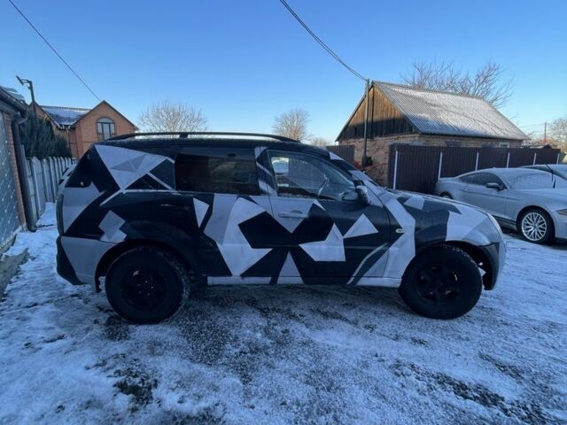 Белый Cанг Йонг Рекстон, объемом двигателя 2.7 л и пробегом 355 тыс. км за 3500 $, фото 3 на Automoto.ua