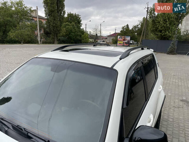Белый Cанг Йонг Рекстон, объемом двигателя 2 л и пробегом 120 тыс. км за 13800 $, фото 11 на Automoto.ua