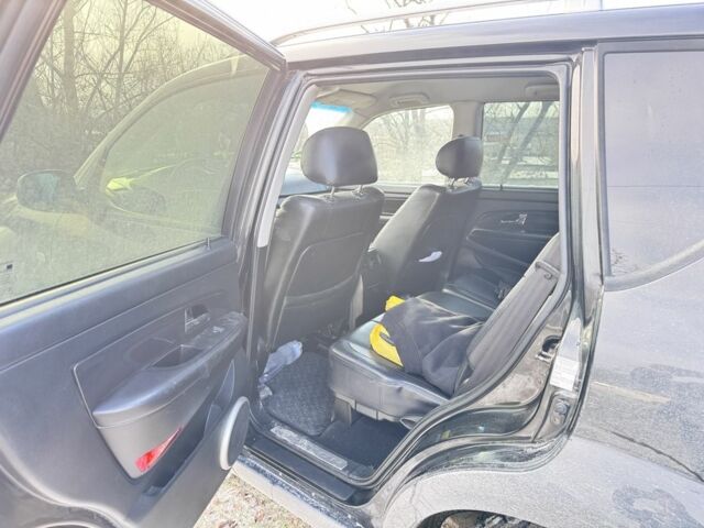 Чорний Cанг Йонг Rexton, об'ємом двигуна 2.7 л та пробігом 303 тис. км за 4500 $, фото 6 на Automoto.ua
