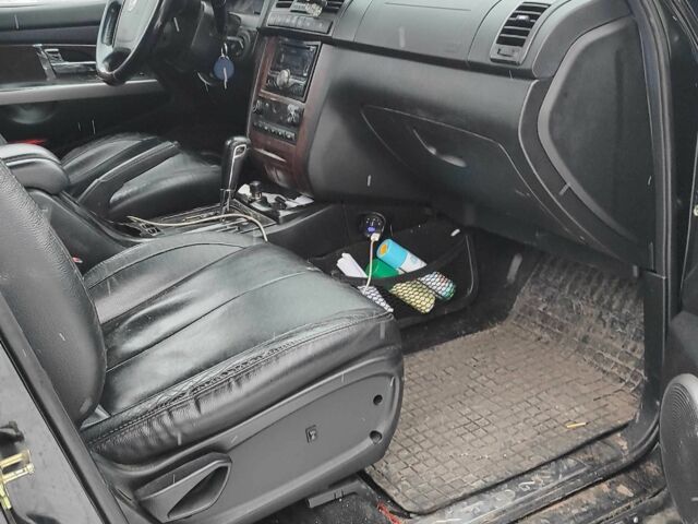 Черный Cанг Йонг Рекстон, объемом двигателя 2.7 л и пробегом 290 тыс. км за 6000 $, фото 5 на Automoto.ua