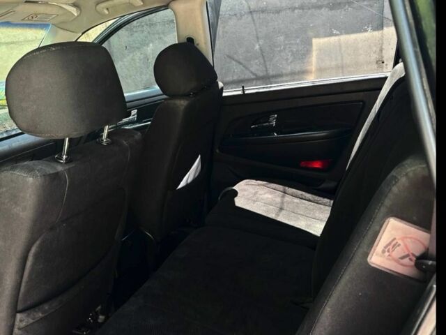 Чорний Cанг Йонг Rexton, об'ємом двигуна 3 л та пробігом 195 тис. км за 6500 $, фото 4 на Automoto.ua