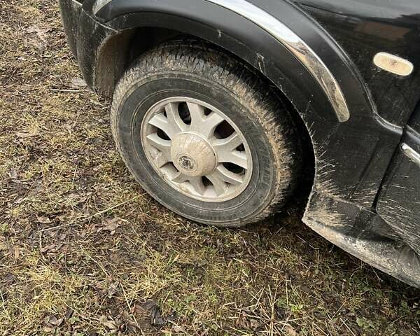 Чорний Cанг Йонг Rexton, об'ємом двигуна 2.7 л та пробігом 125 тис. км за 7000 $, фото 1 на Automoto.ua