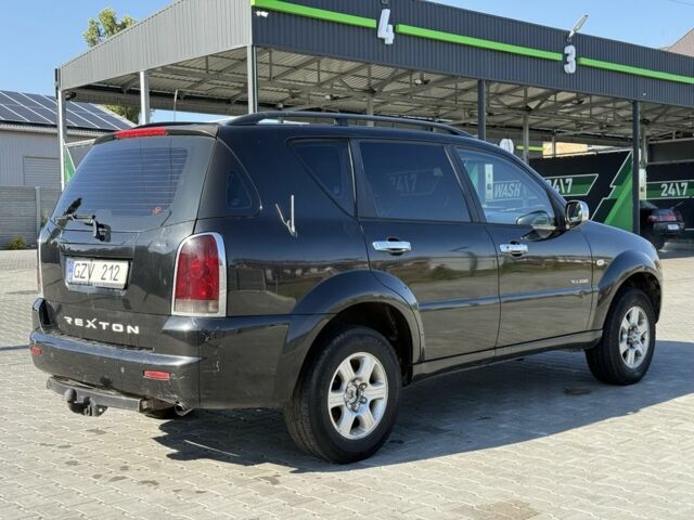 Черный Cанг Йонг Рекстон, объемом двигателя 2.9 л и пробегом 1 тыс. км за 1700 $, фото 5 на Automoto.ua