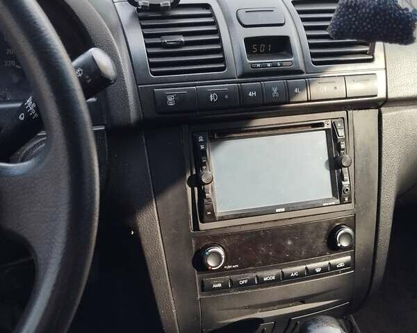 Черный Cанг Йонг Рекстон, объемом двигателя 2.69 л и пробегом 310 тыс. км за 6000 $, фото 4 на Automoto.ua