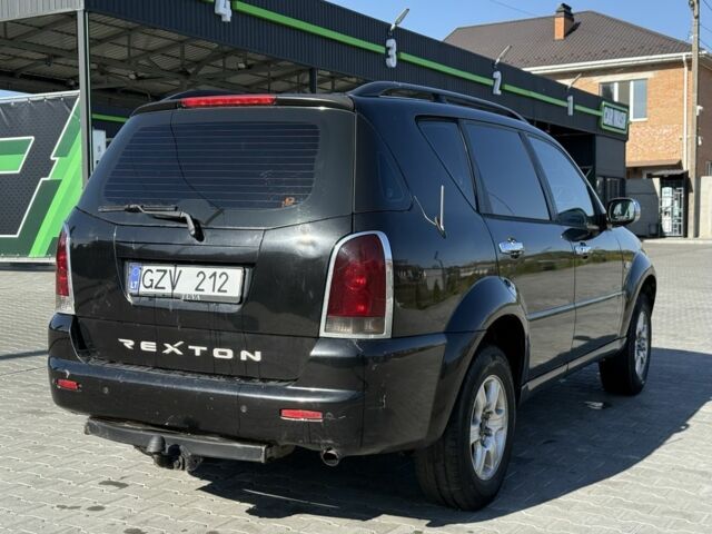 Черный Cанг Йонг Рекстон, объемом двигателя 2.9 л и пробегом 1 тыс. км за 1700 $, фото 7 на Automoto.ua