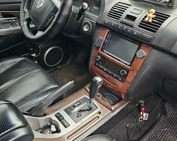 Чорний Cанг Йонг Rexton, об'ємом двигуна 2.8 л та пробігом 200 тис. км за 3200 $, фото 4 на Automoto.ua